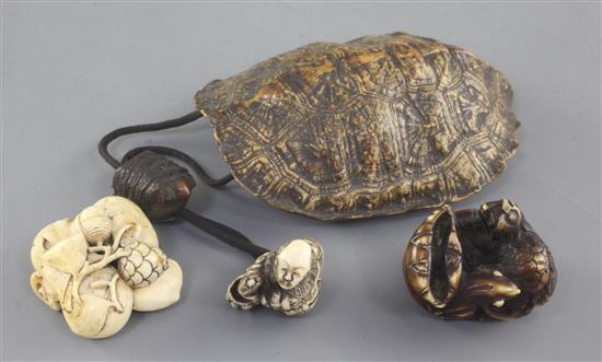 Two Japanese ivory netsuke and a turtle carapace pouch and netsuke, 19th century, carapace 10.7cm (3)